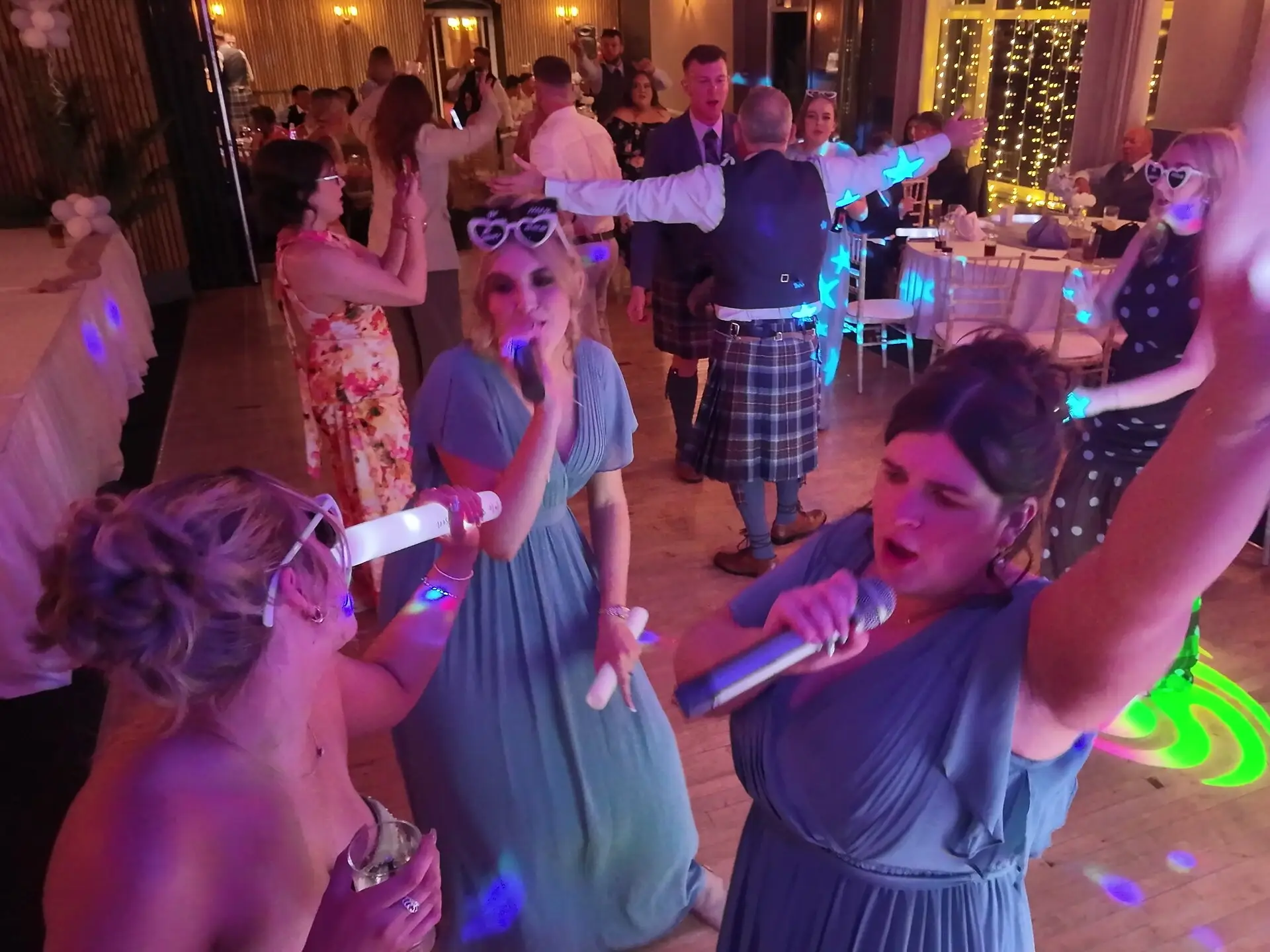 Guests singing on the wireless microphones on the dancefloor